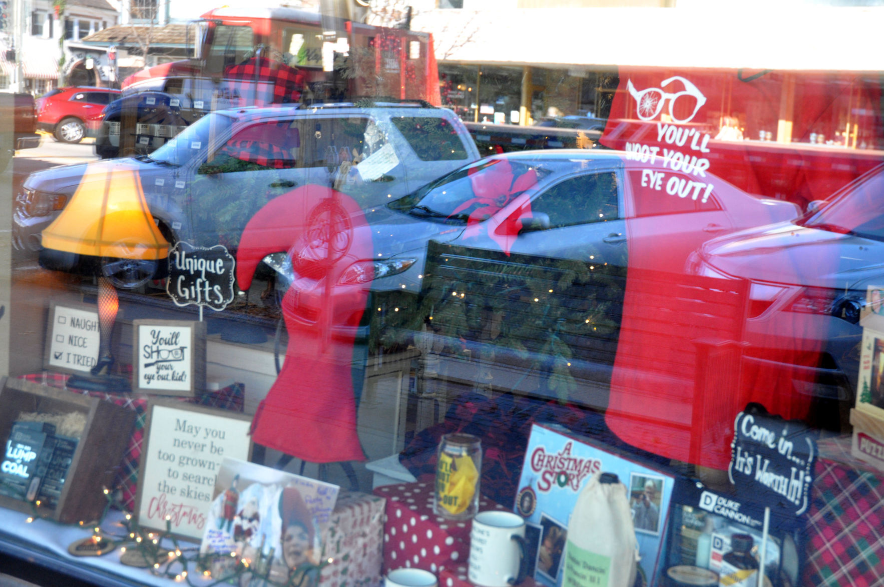 Queen Bee Artisan Market, 830 W. Main. St., decorated their windows in the theme of the movie "A Christmas Carole"